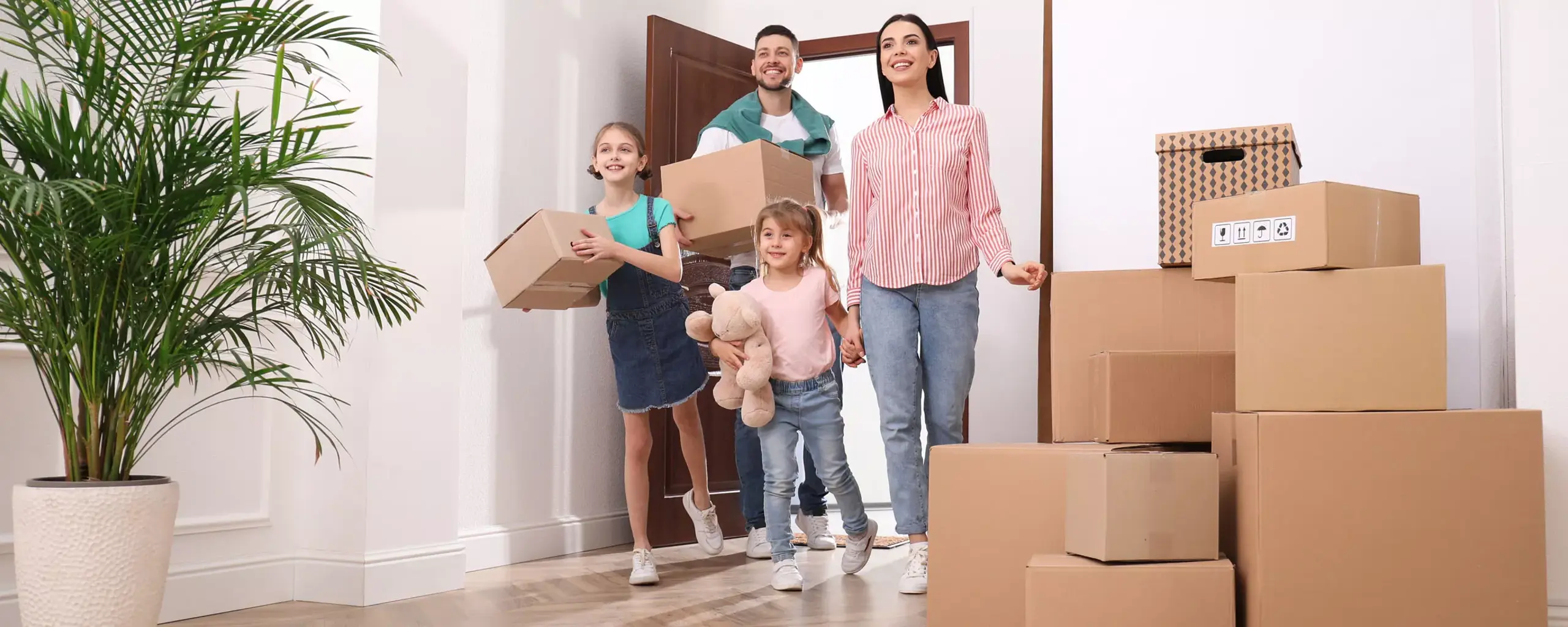 Family Moving In With Boxes