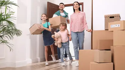 Family Moving In With Boxes